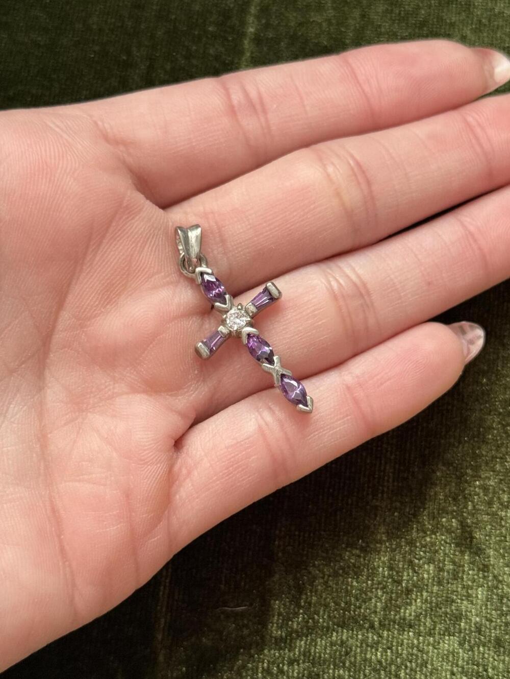 Silvertone cross pendant with purple and clear stones
